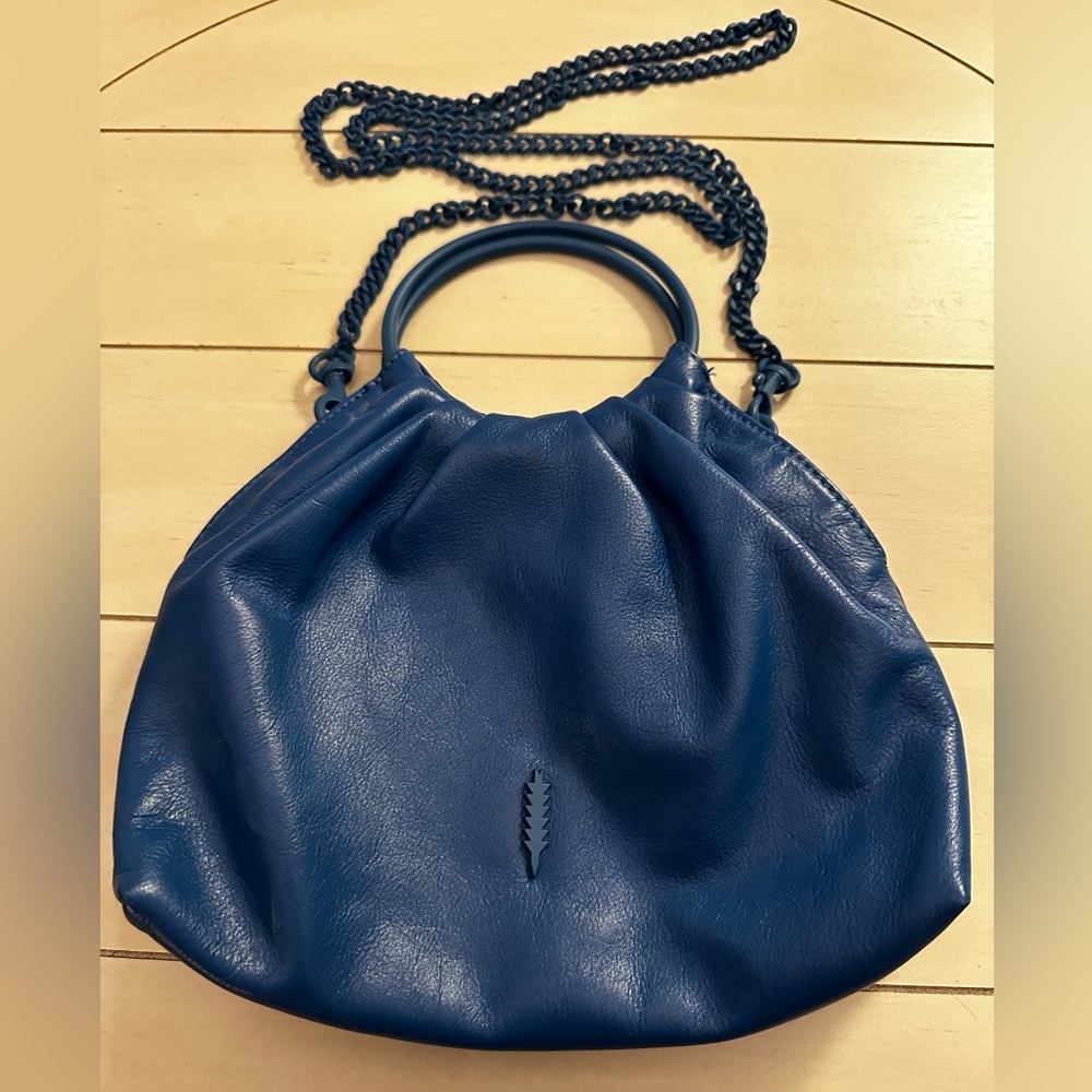 Cobalt blue leather Thacker crossbody with matching blue chain and ring handles